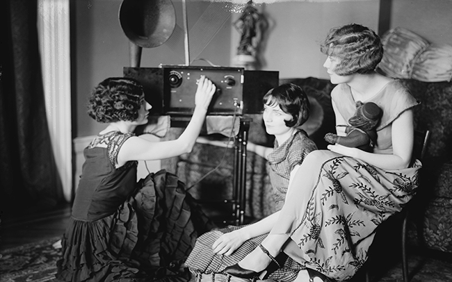 The Brox Sisters, tuning radio. Left to right, Patricia, Bobbe, Loryane, mid 1920's