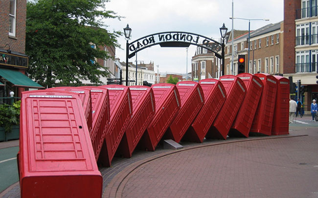 toppled phone boxes, artwork, David Mach